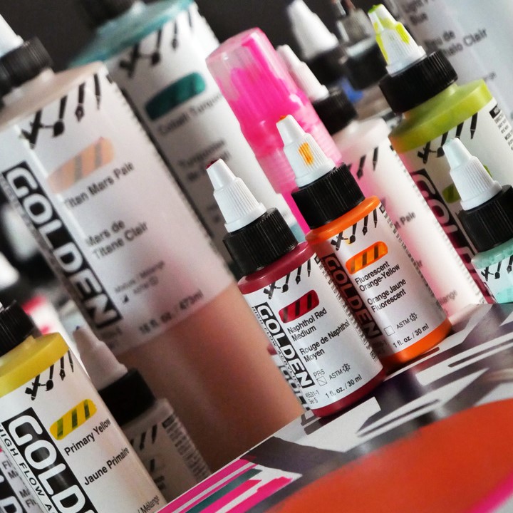 High Flow is acrylic paint that can go from brush to marker or from dip pen  to airbrush and more. From fine lines to broad strokes, High Flow Acrylic  has